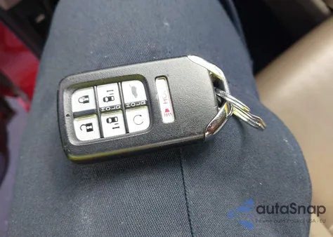 2023 Honda Odyssey Touring z USA, uszkodzony, nr VIN 5FNRL6H8XPB014625